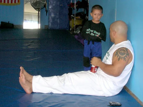 Master Chim coaching kids at Jungle Gym Martial Arts